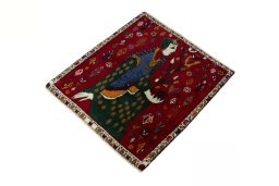Corner detail of 2000s Shiraz rug showing border pattern and Wool pile