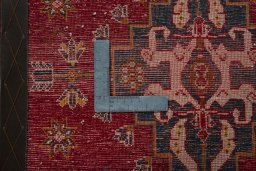 Backside of handmade 2000s Shiraz rug showing knot structure and weave density