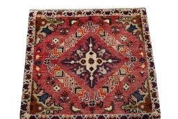 Surface texture of 2000s Shiraz rug with natural Wool and intricate pattern