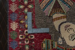 Backside of handmade 2000s Shiraz rug showing knot structure and weave density