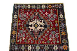 Surface texture of 2000s Shiraz rug with natural Wool and intricate pattern