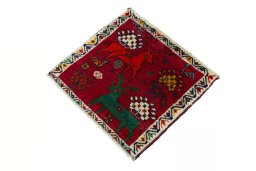 Corner detail of 2000s Shiraz rug showing border pattern and Wool pile