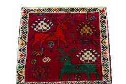 Surface texture of 2000s Shiraz rug with natural Wool and intricate pattern