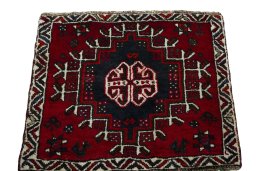 Surface texture of 2000s Shiraz rug with natural Wool and intricate pattern