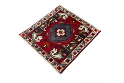 Corner detail of 2000s Shiraz rug showing border pattern and Wool pile