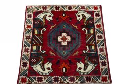 Surface texture of 2000s Shiraz rug with natural Wool and intricate pattern