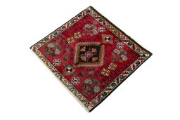Corner detail of 2000s Shiraz rug showing border pattern and Wool pile