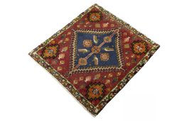 Corner detail of 2000s Shiraz rug showing border pattern and Wool pile
