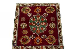 Surface texture of 2000s Shiraz rug with natural Wool and intricate pattern