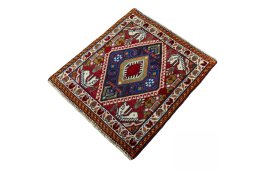 Corner detail of 2000s Shiraz rug showing border pattern and Wool pile