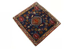 Corner detail of 2000s Shiraz rug showing border pattern and Wool pile