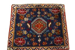 Surface texture of 2000s Shiraz rug with natural Wool and intricate pattern