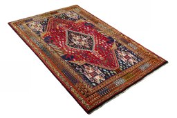 Close-up detail of 2000s Shiraz rug from Iran / Persia showing Wool weave
