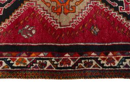 Close-up detail of 2000s Shiraz rug from Iran / Persia showing Wool weave