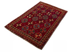 Corner detail of 2000s Shiraz rug showing border pattern and Wool pile