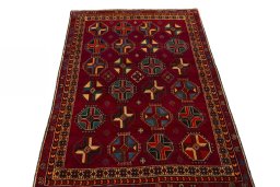 Surface texture of 2000s Shiraz rug with natural Wool and intricate pattern