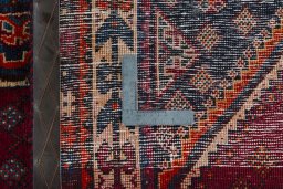 Close-up detail of 2000s Shiraz rug from Iran / Persia showing Wool weave