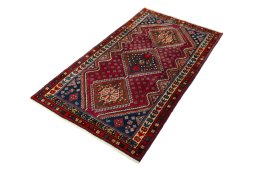 Corner detail of 2000s Shiraz rug showing border pattern and Wool pile