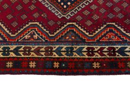 Close-up detail of 2000s Shiraz rug from Iran / Persia showing Wool weave