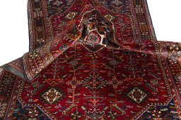 Close-up detail of 2000s Shiraz rug from Iran / Persia showing Wool weave