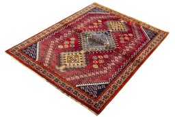 Corner detail of 2000s Shiraz rug showing border pattern and Wool pile