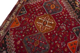 Backside of handmade 2000s Shiraz rug showing knot structure and weave density