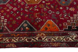 Close-up detail of 2000s Shiraz rug from Iran / Persia showing Wool weave