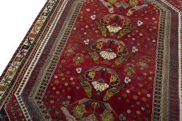 Backside of handmade 2000s Shiraz rug showing knot structure and weave density
