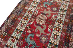 Backside of handmade 2000s Shiraz rug showing knot structure and weave density