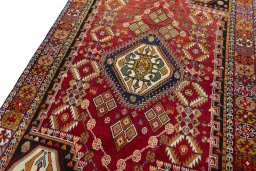 Backside of handmade New Shiraz rug showing knot structure and weave density