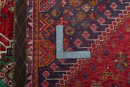 Close-up detail of 2000s Shiraz rug from Iran / Persia showing Wool weave