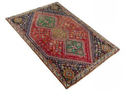 Close-up detail of 2000s Shiraz rug from Iran / Persia showing Wool weave