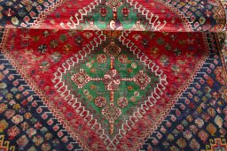 Full view of 2000s Shiraz rug from Iran / Persia, 175 × 120 cm in Red tones