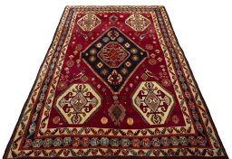 Surface texture of 2000s Shiraz rug with natural Wool and intricate pattern
