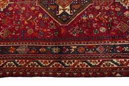 Full view of 2000s Shiraz rug from Iran / Persia, 268 × 167 cm in Red tones
