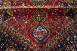 Full view of 2000s Shiraz rug from Iran / Persia, 243 × 160 cm in Red tones