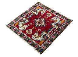Corner detail of 2000s Shiraz rug showing border pattern and Wool pile
