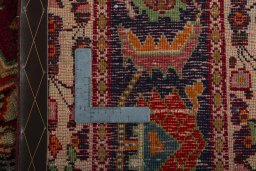 Backside of handmade 2000s Shiraz rug showing knot structure and weave density