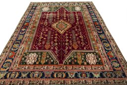 Surface texture of 2000s Shiraz rug with natural Wool and intricate pattern