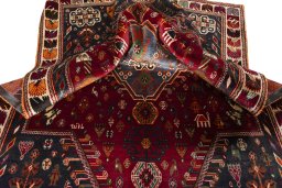 Surface texture of 2000s Shiraz rug with natural Wool and intricate pattern