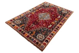 Corner detail of 2000s Shiraz rug showing border pattern and Wool pile