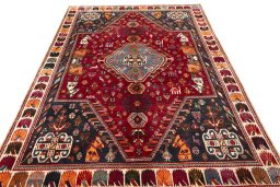 Surface texture of 2000s Shiraz rug with natural Wool and intricate pattern