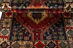 Corner detail of 2000s Shiraz rug showing border pattern and Wool pile