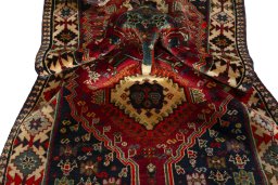 Close-up detail of 2000s Shiraz rug from Iran / Persia showing Wool weave