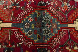 Central medallion detail of 2000s Shiraz rug from Iran / Persia