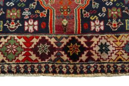 Close-up detail of 2000s Shiraz rug from Iran / Persia showing Wool weave