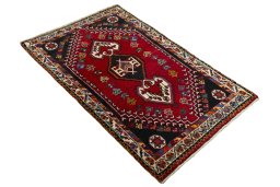 Close-up detail of 2000s Shiraz rug from Iran / Persia showing Wool weave