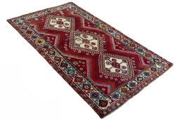 Close-up detail of 1970s Shiraz rug from Iran / Persia showing Wool weave