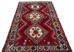 Surface texture of 1970s Shiraz rug with natural Wool and intricate pattern