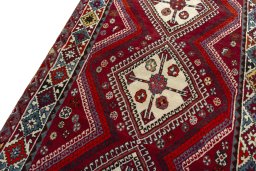 Backside of handmade 1970s Shiraz rug showing knot structure and weave density